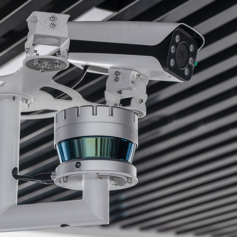 Commercial CCTV camera installation with a high-tech design and sensor features.